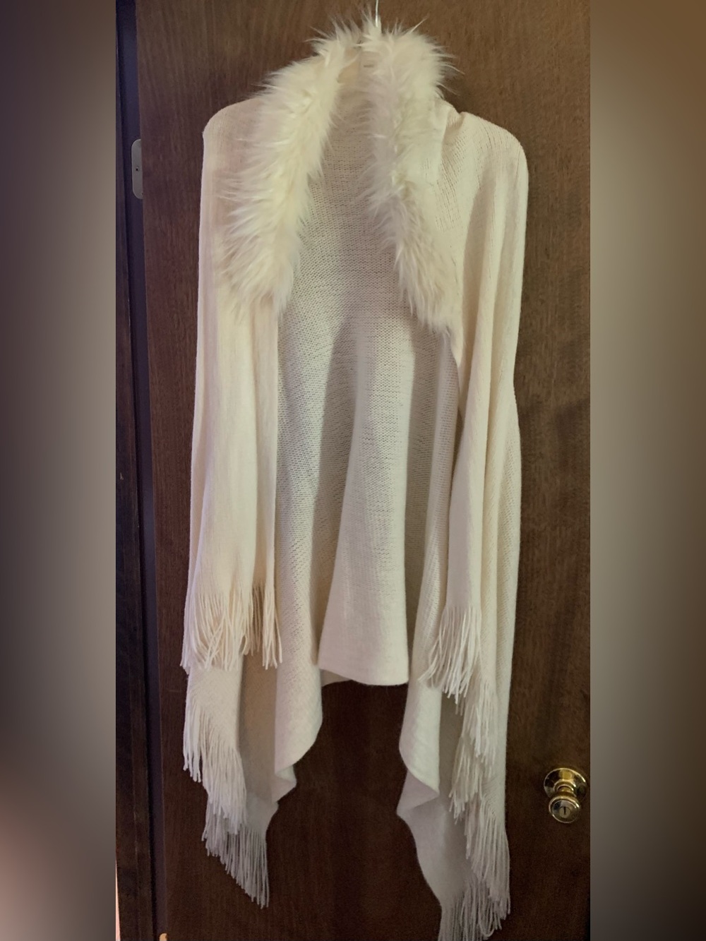 Northern Angel Sleeveless Cream Faux-Fur Trim Open Front Poncho with Fringe Hem